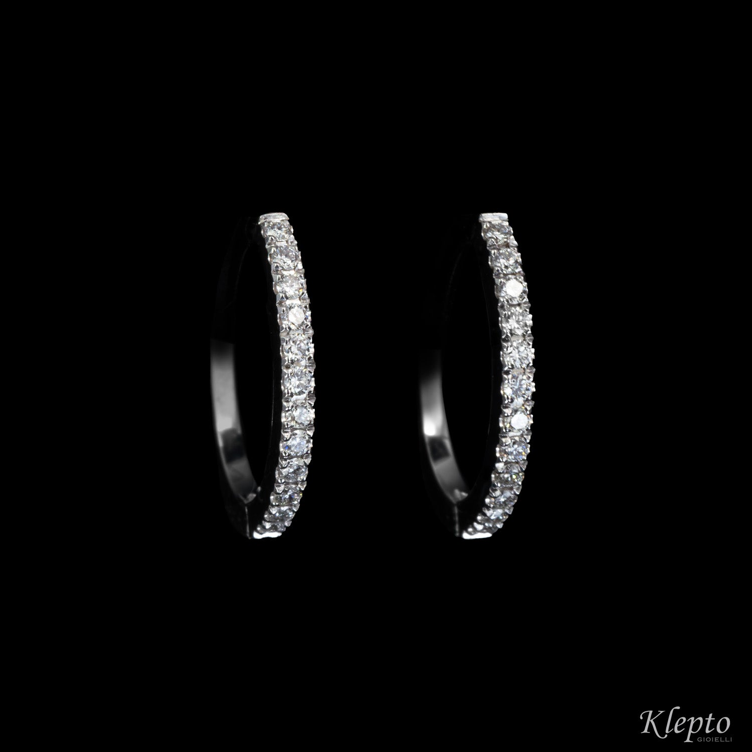 White gold oval circle earrings with diamonds