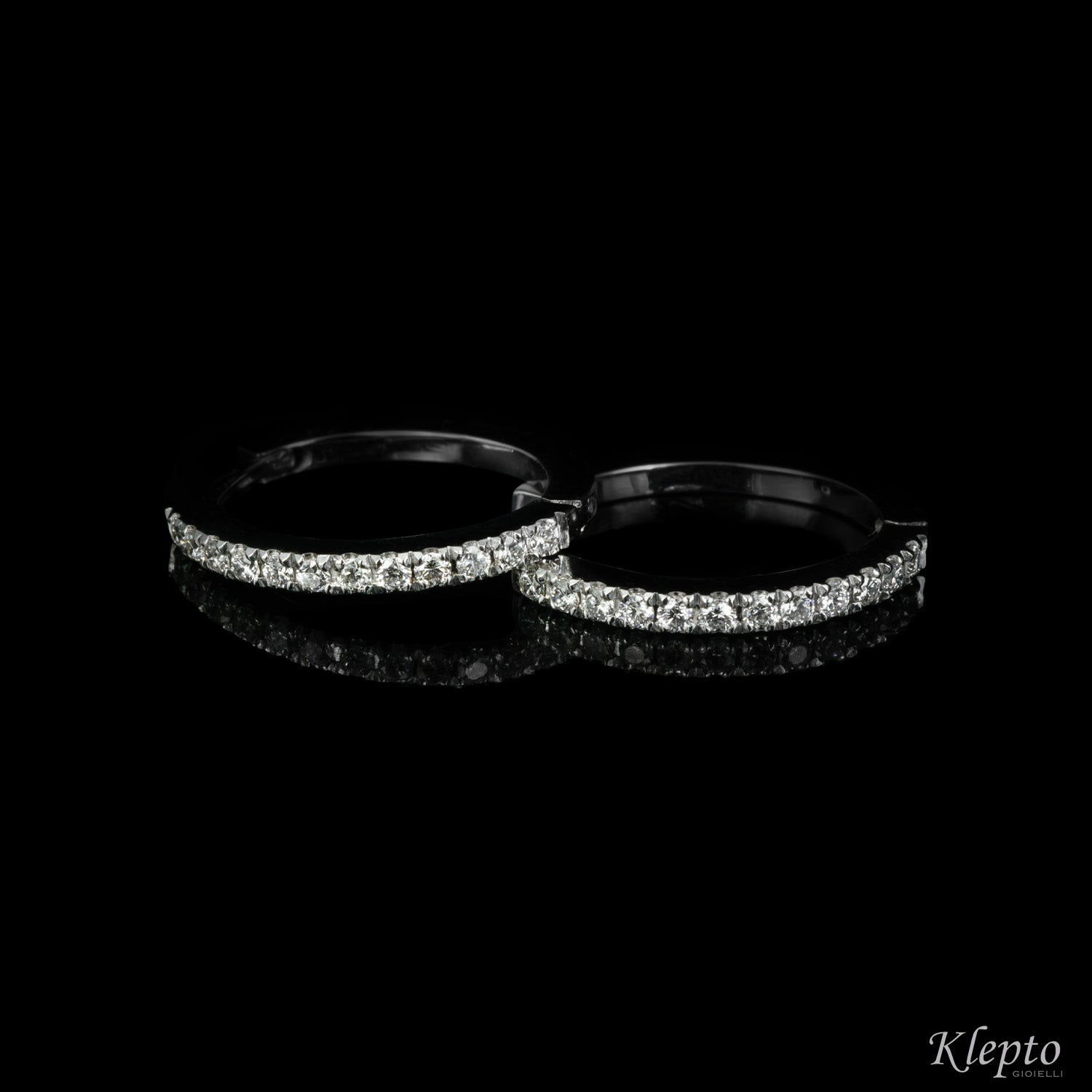 White gold oval circle earrings with diamonds