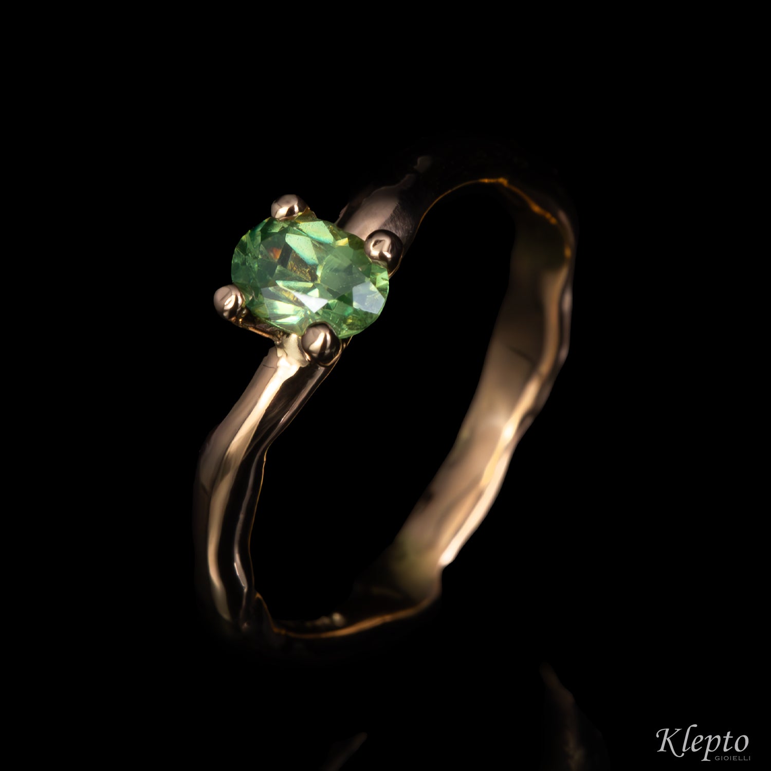Rose gold ring "Divenire" with Demantoid
