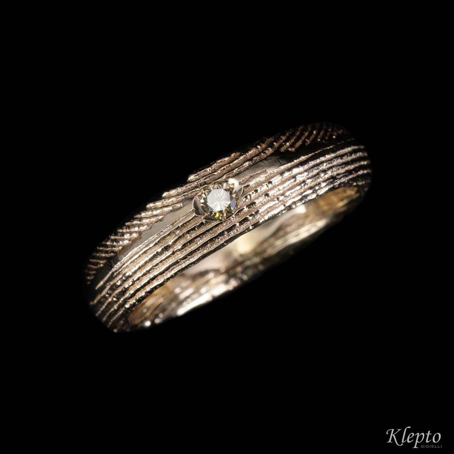 Natural white gold ring with brown diamond