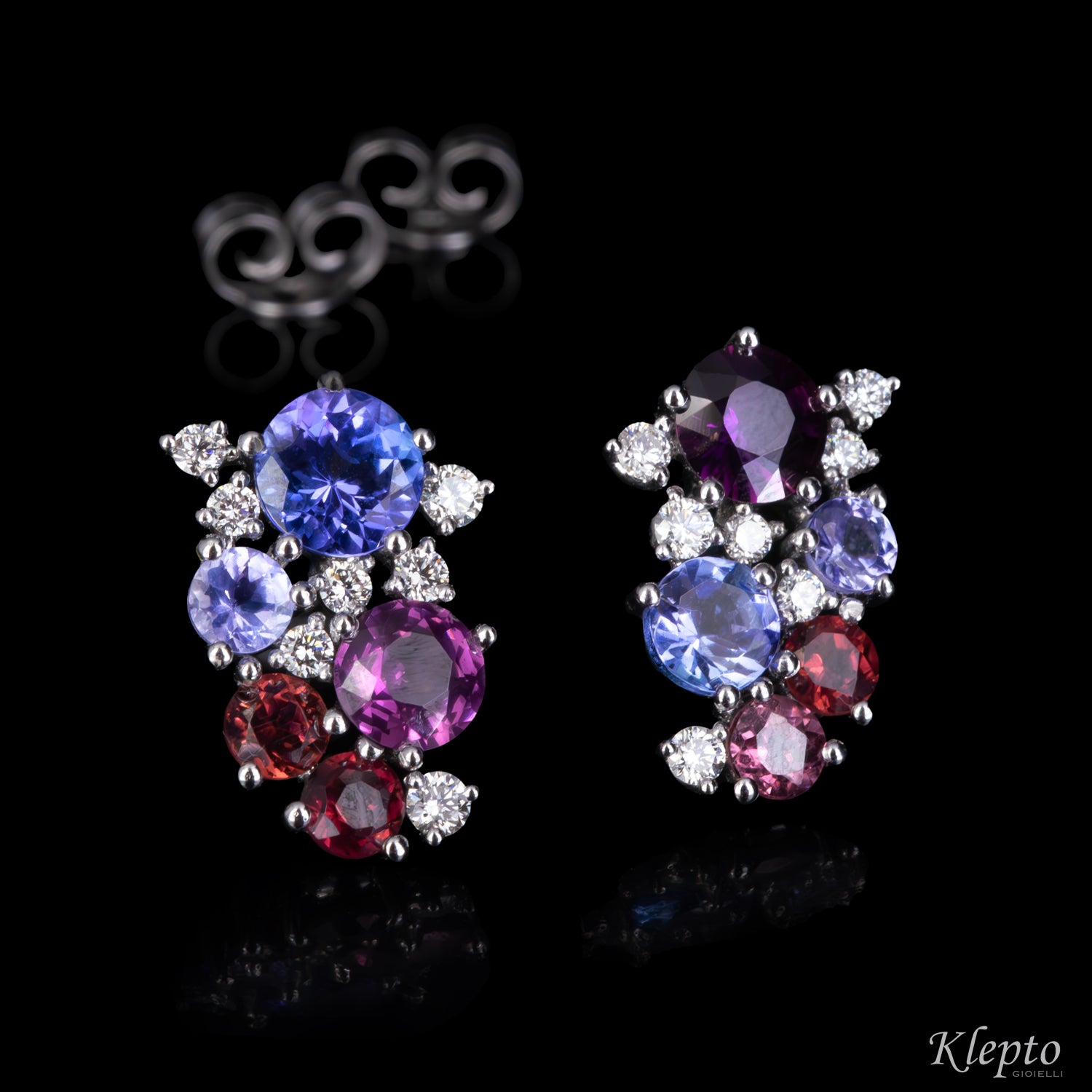 White gold earrings with Tanzanites, Sapphires, Rhodolites, and Diamonds