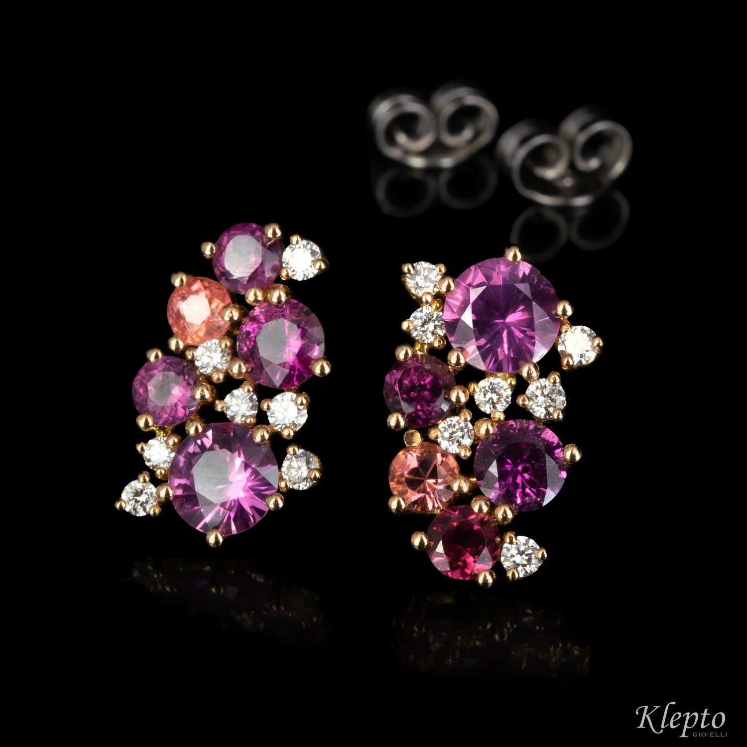 Rose and white gold earrings with pink sapphires, rhodolites, pink tourmalines, and diamonds