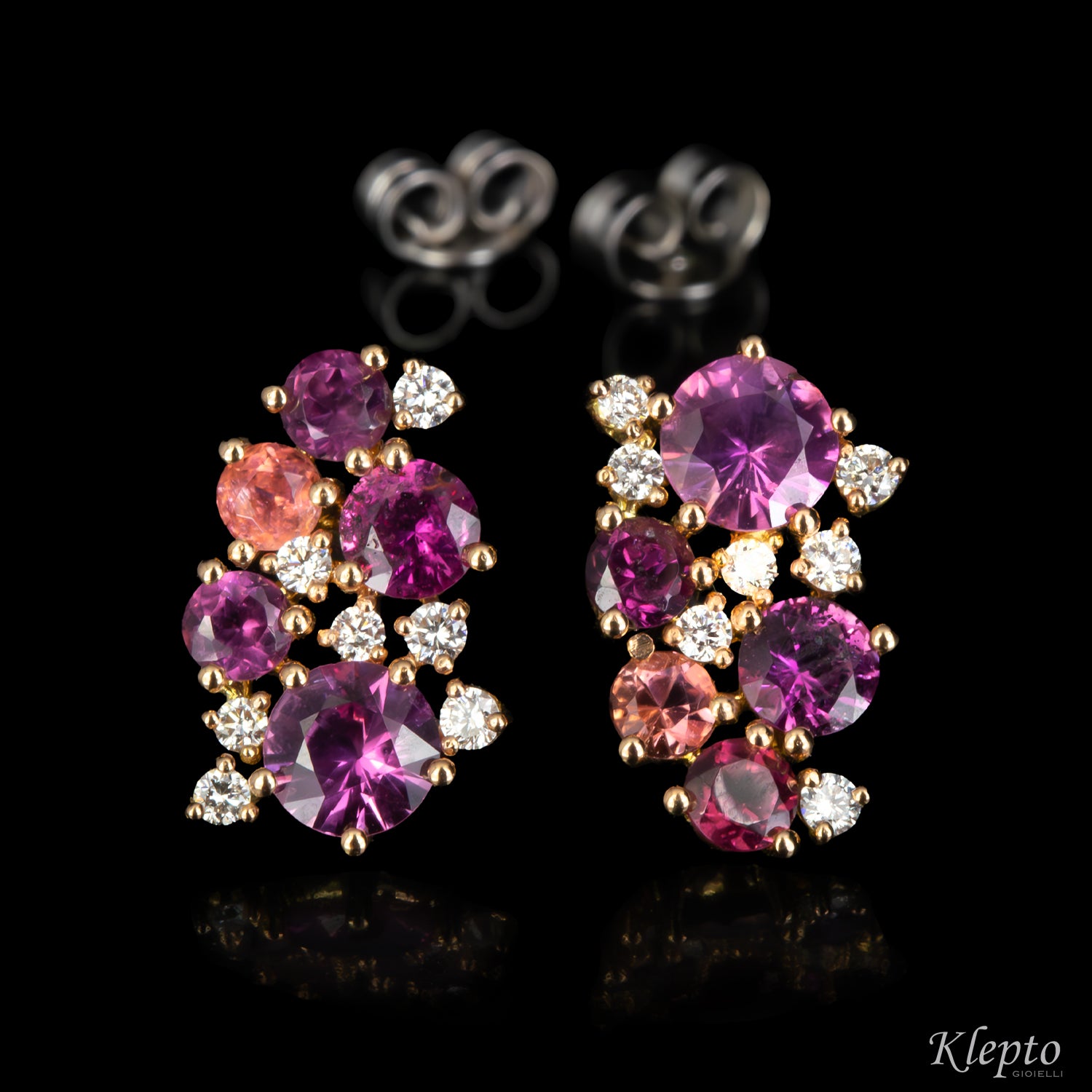 Rose and white gold earrings with pink sapphires, rhodolites, pink tourmalines, and diamonds