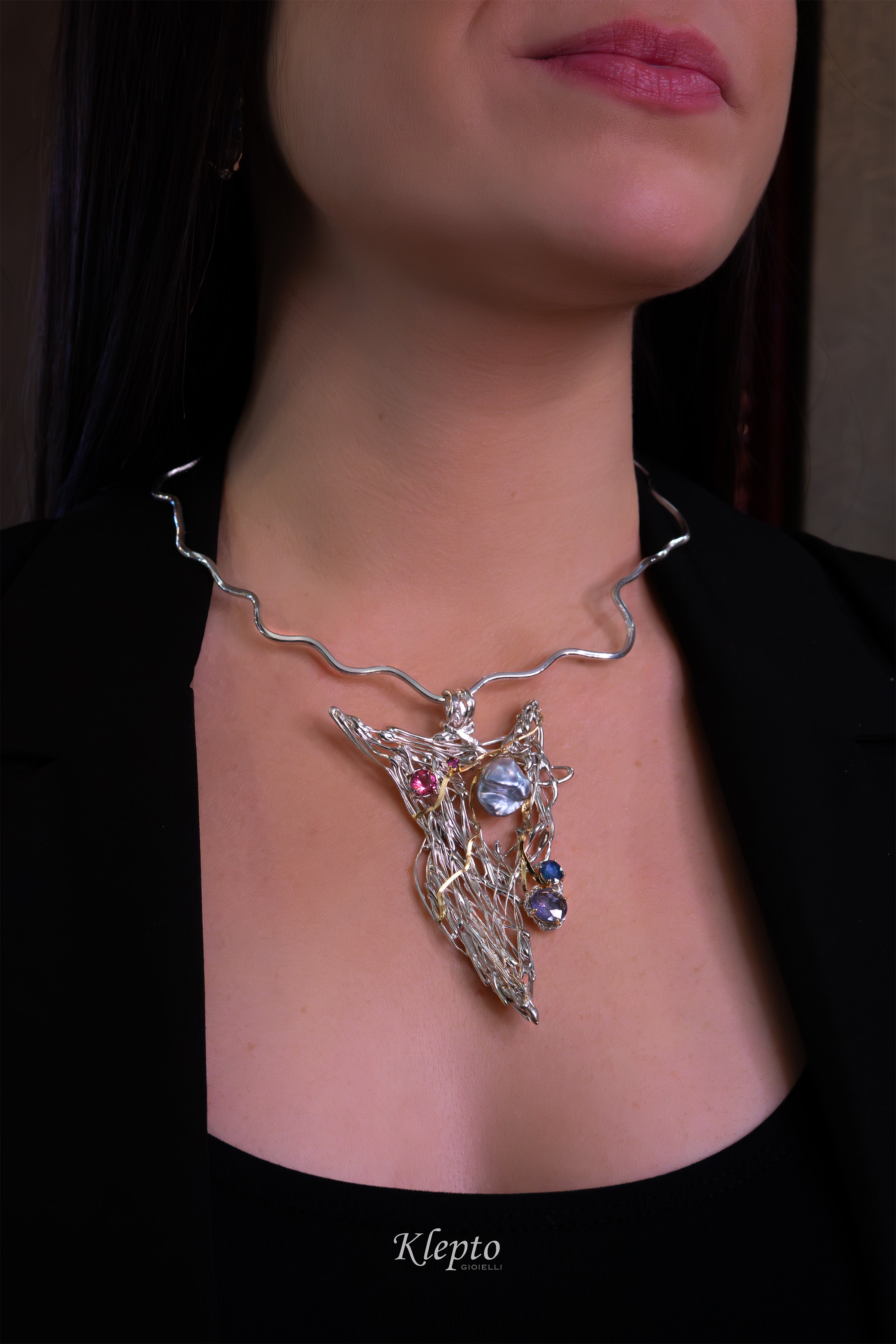 Silver necklace in Silnova® with Keshi pearl, sapphires, tourmaline, rhodolite, and yellow gold details.