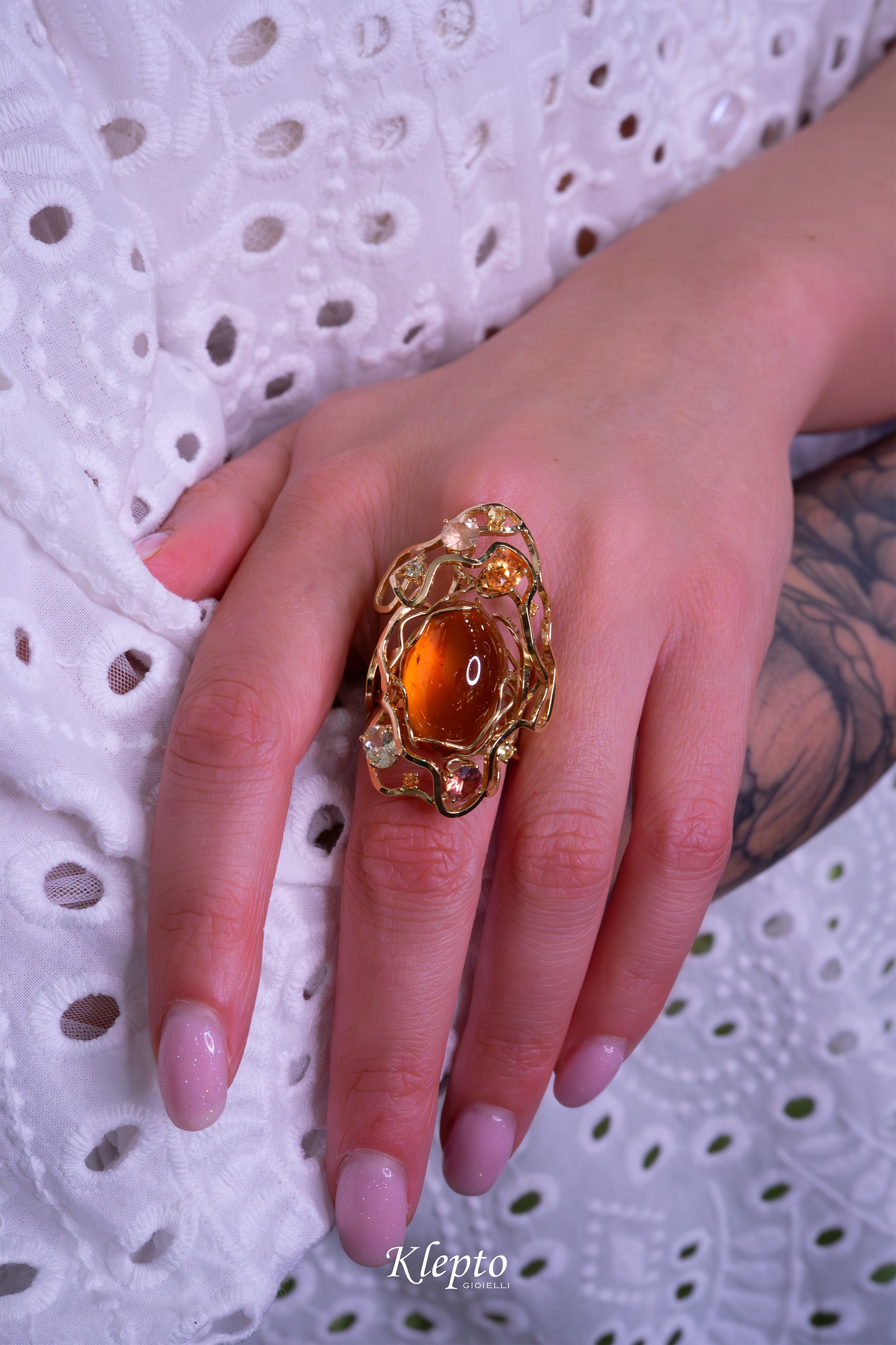 Yellow gold ring "Origins" with Spessartite, Sapphires, Zircons, and Garnet fanta