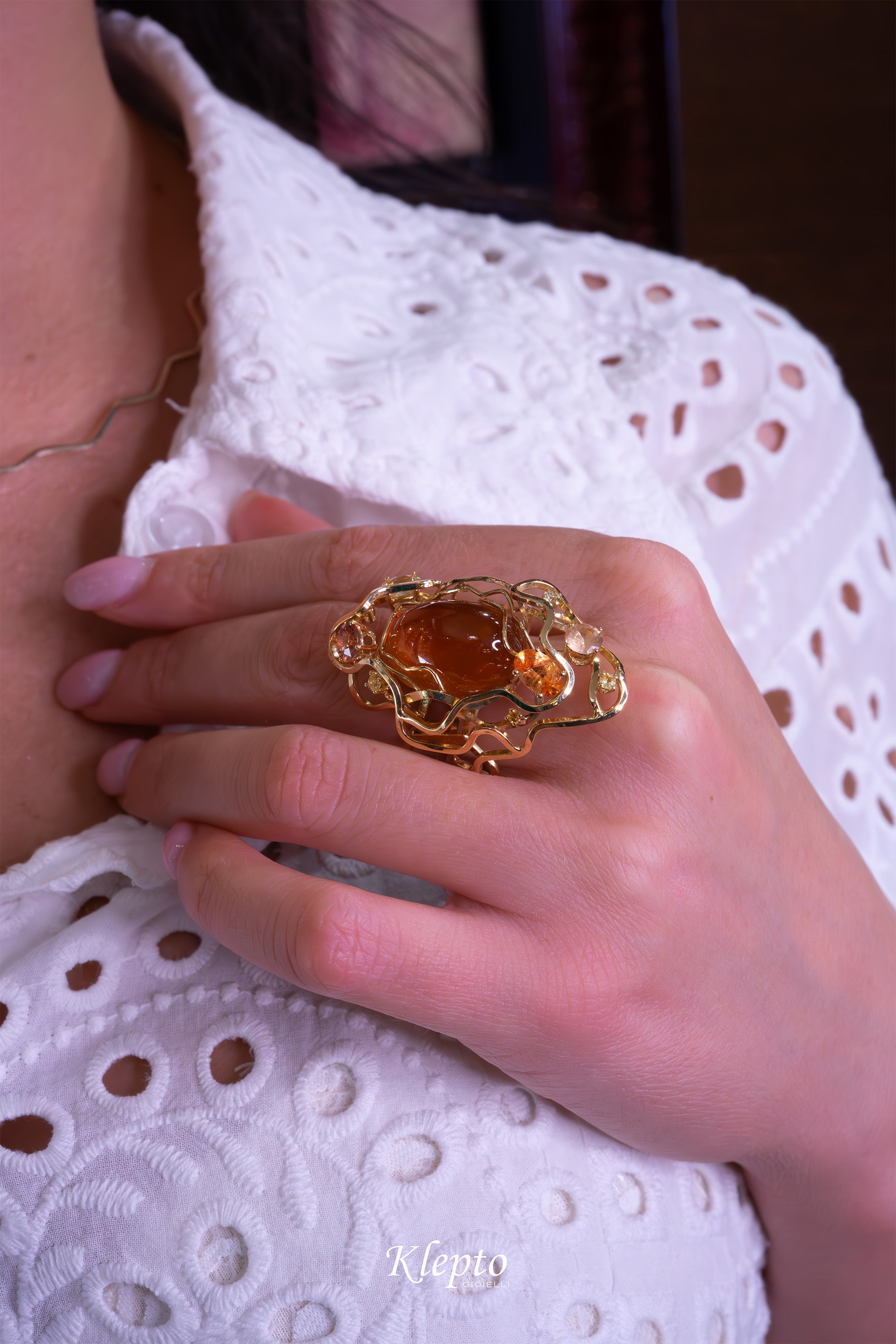 Yellow gold ring "Origins" with Spessartite, Sapphires, Zircons, and Garnet fanta
