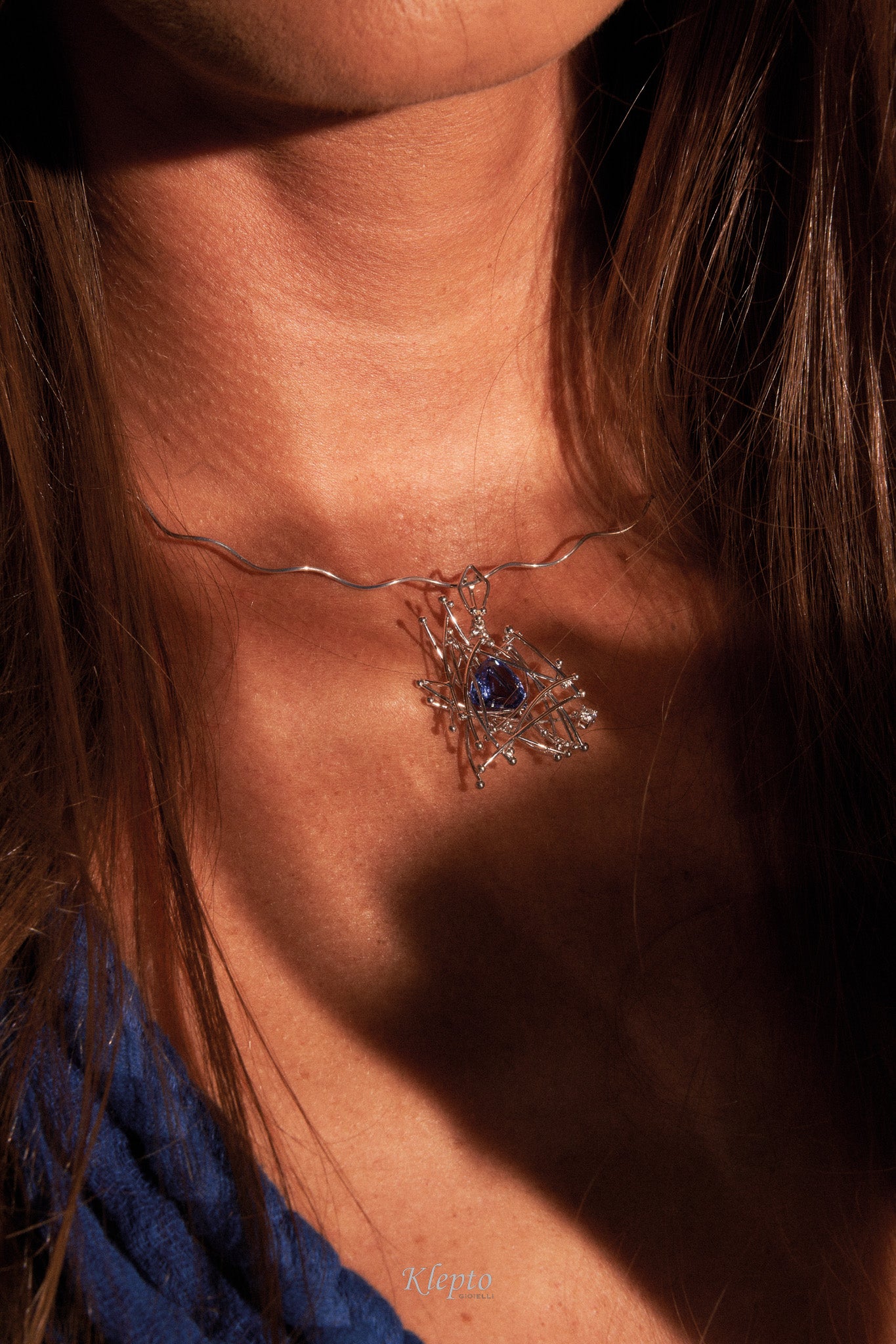 "IntriKo" white gold pendant with Tanzanite and Diamond
