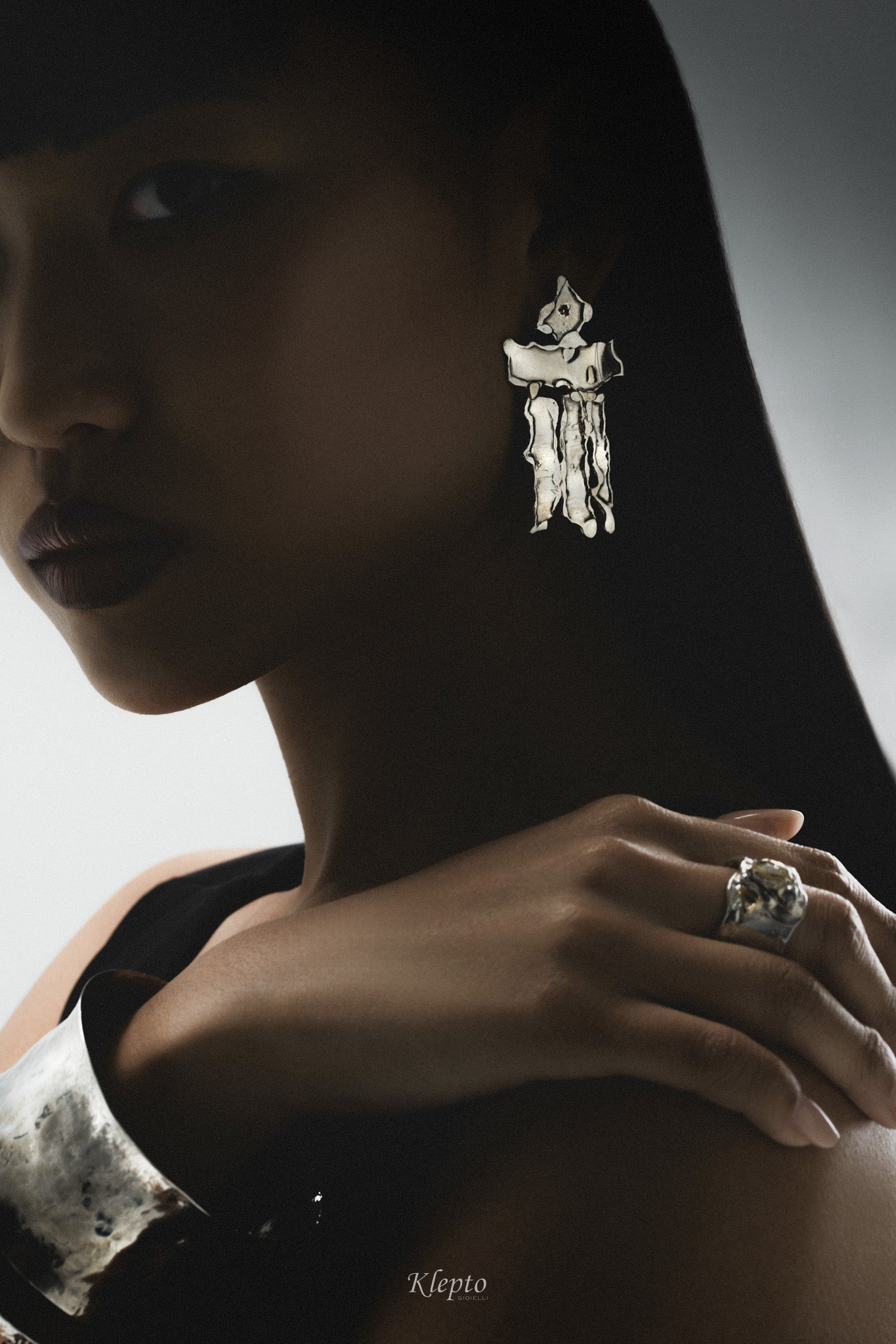 Flame-fused asymmetric Silnova® Silver earrings