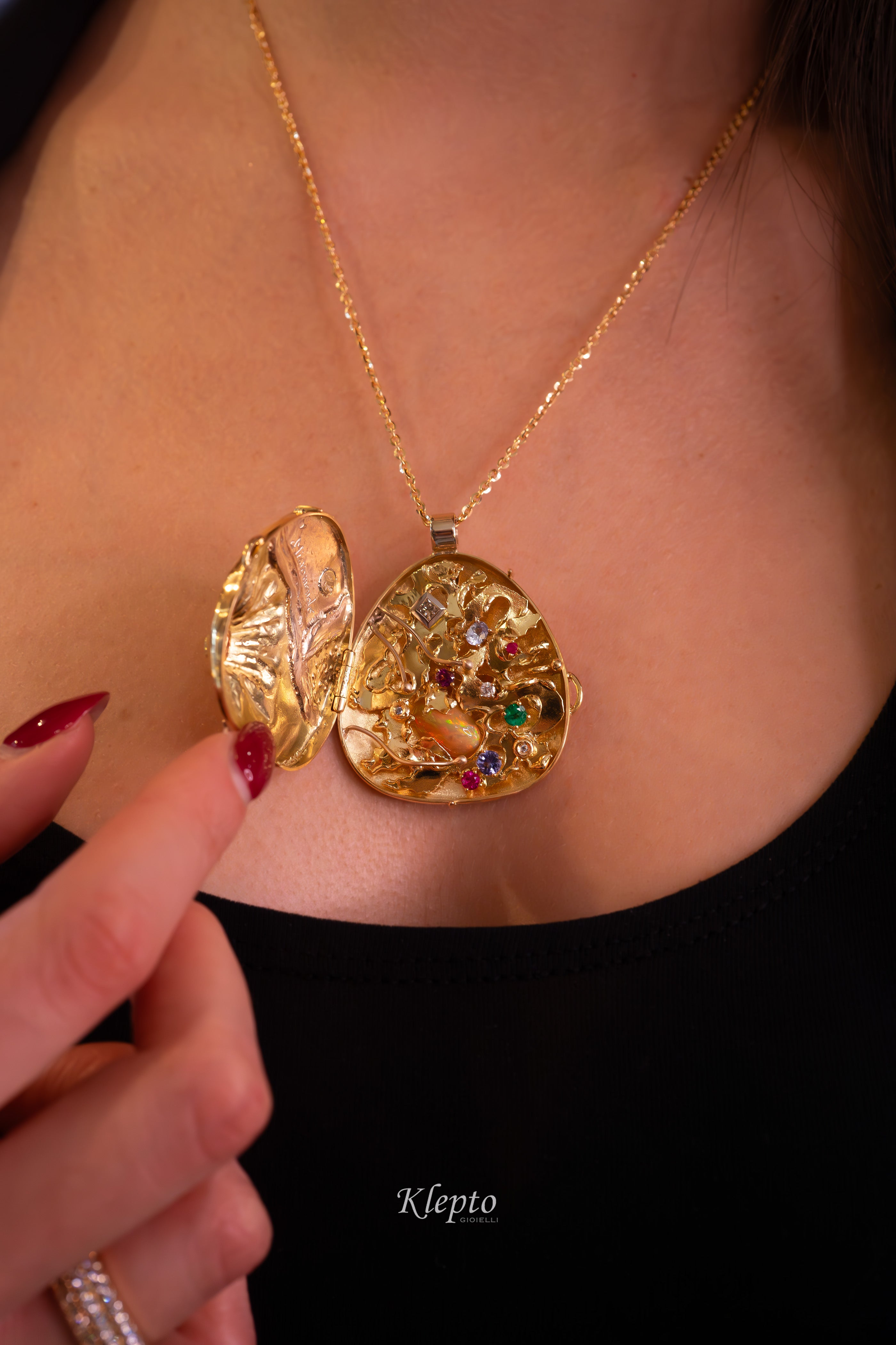 "Micromondo" sculpture gold pendant with precious stones and hidden treasure