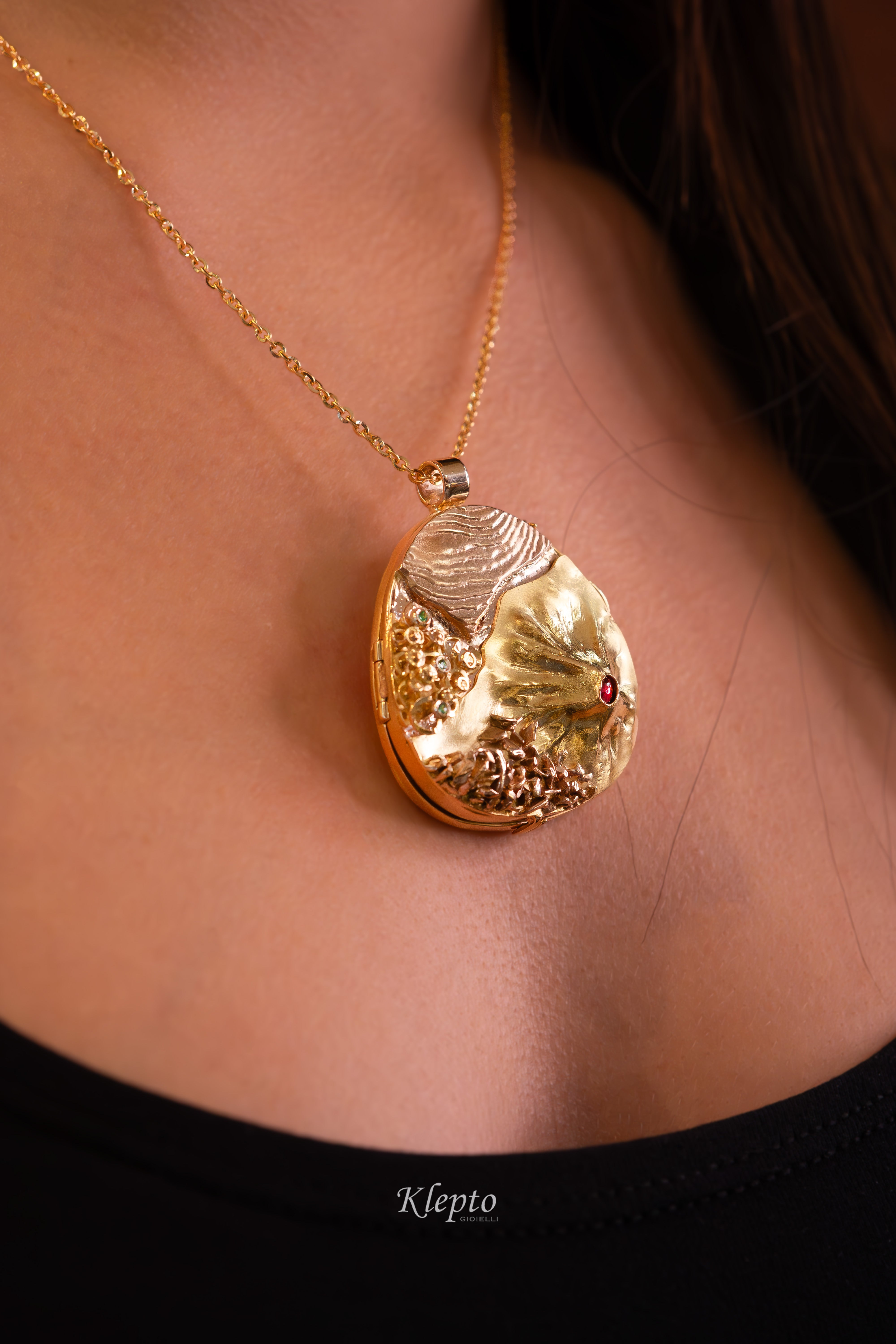 "Micromondo" sculpture gold pendant with precious stones and hidden treasure