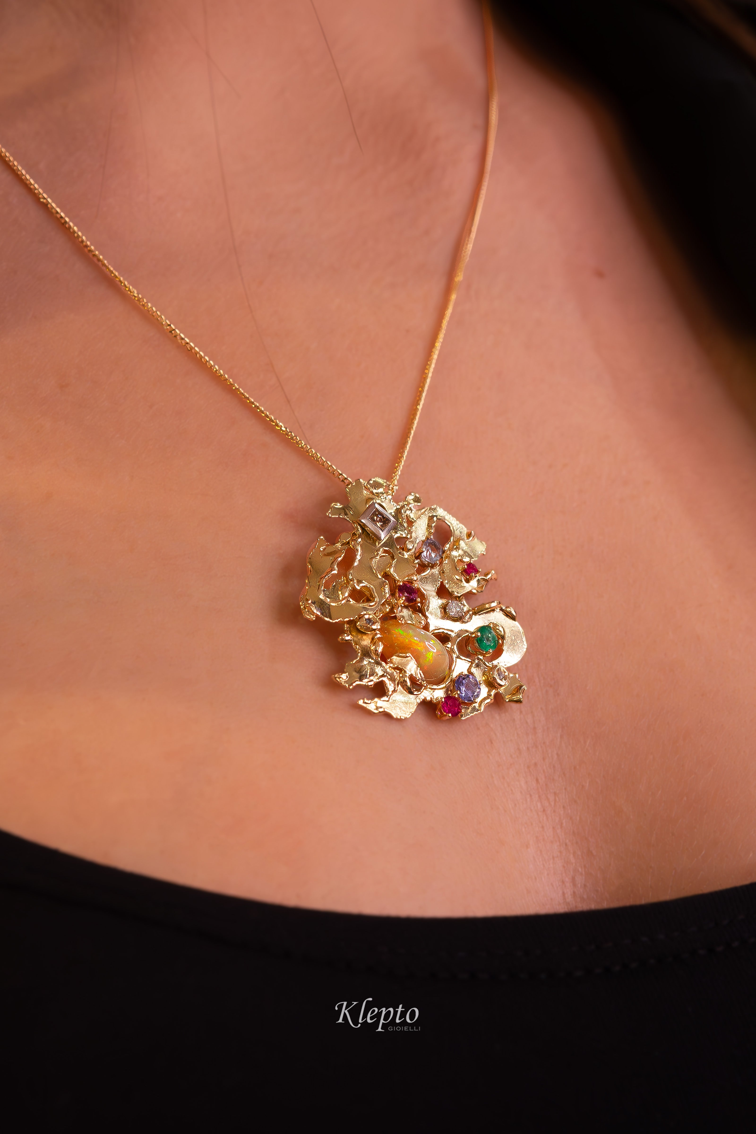 "Micromondo" sculpture gold pendant with precious stones and hidden treasure