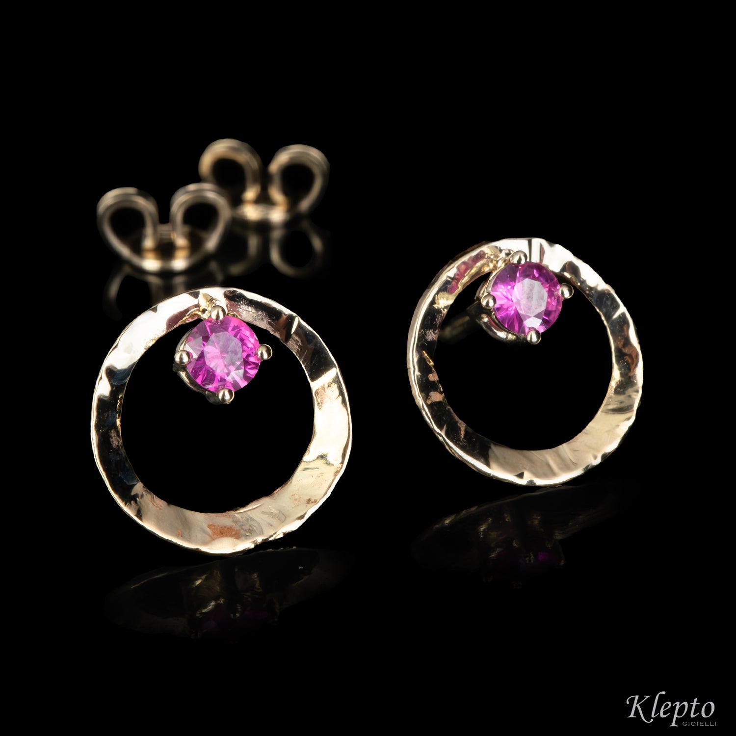 Natural white gold earrings "Pulsar" with Rubies