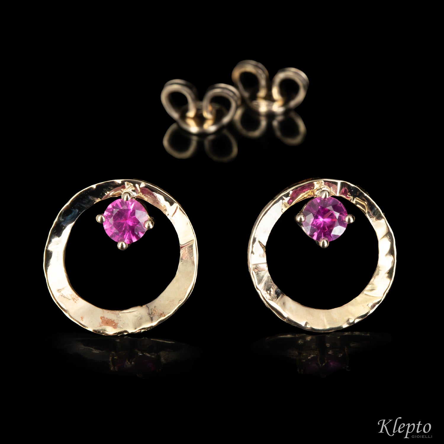 Natural white gold earrings "Pulsar" with Rubies