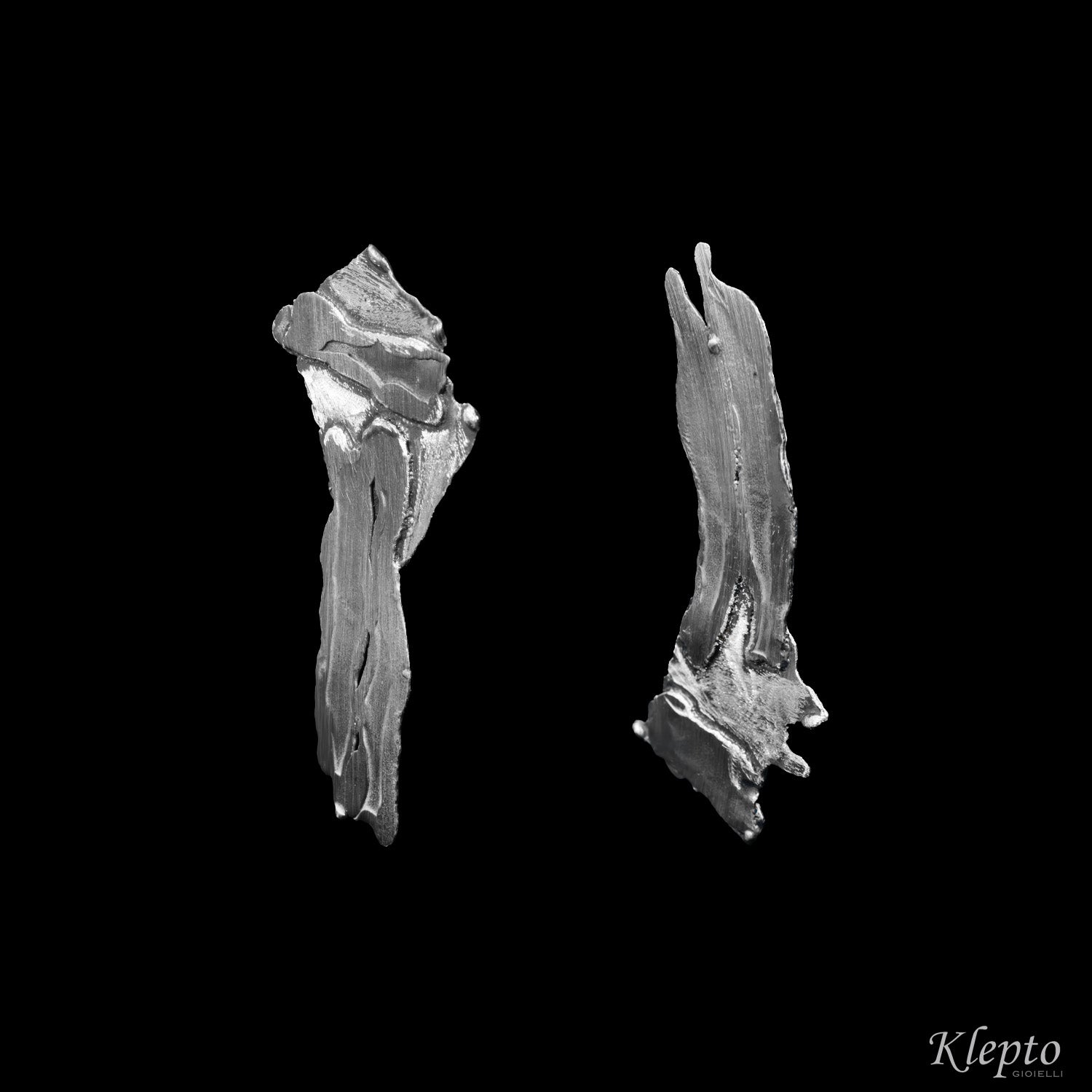 Asymmetric burnished and satin Silnova® Silver earrings