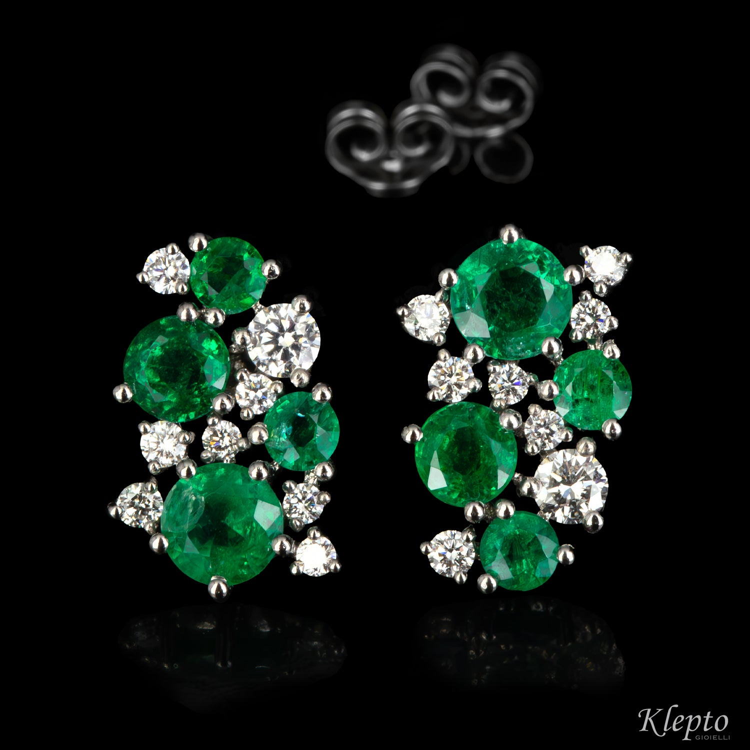 White gold earrings with emeralds and diamonds