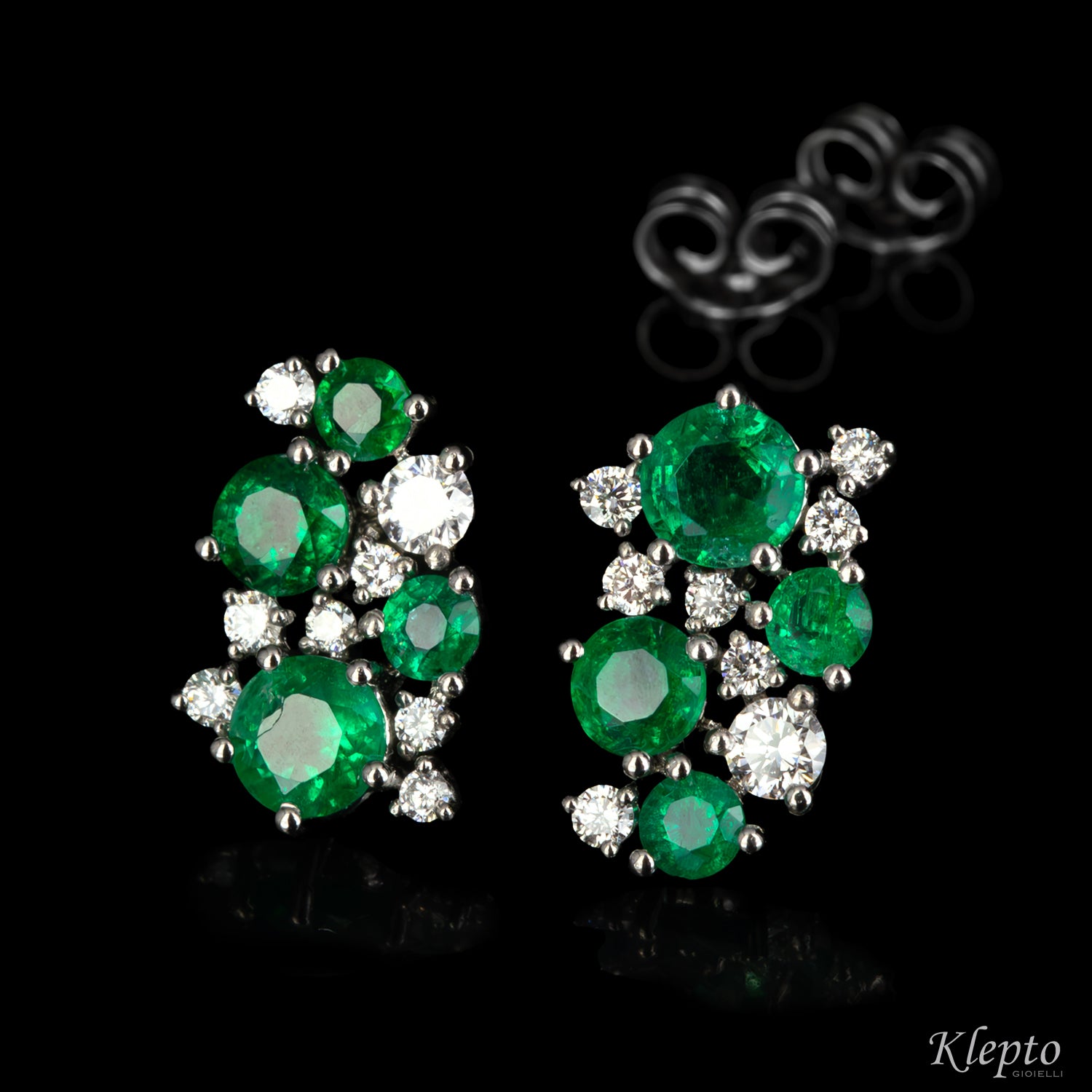 White gold earrings with emeralds and diamonds