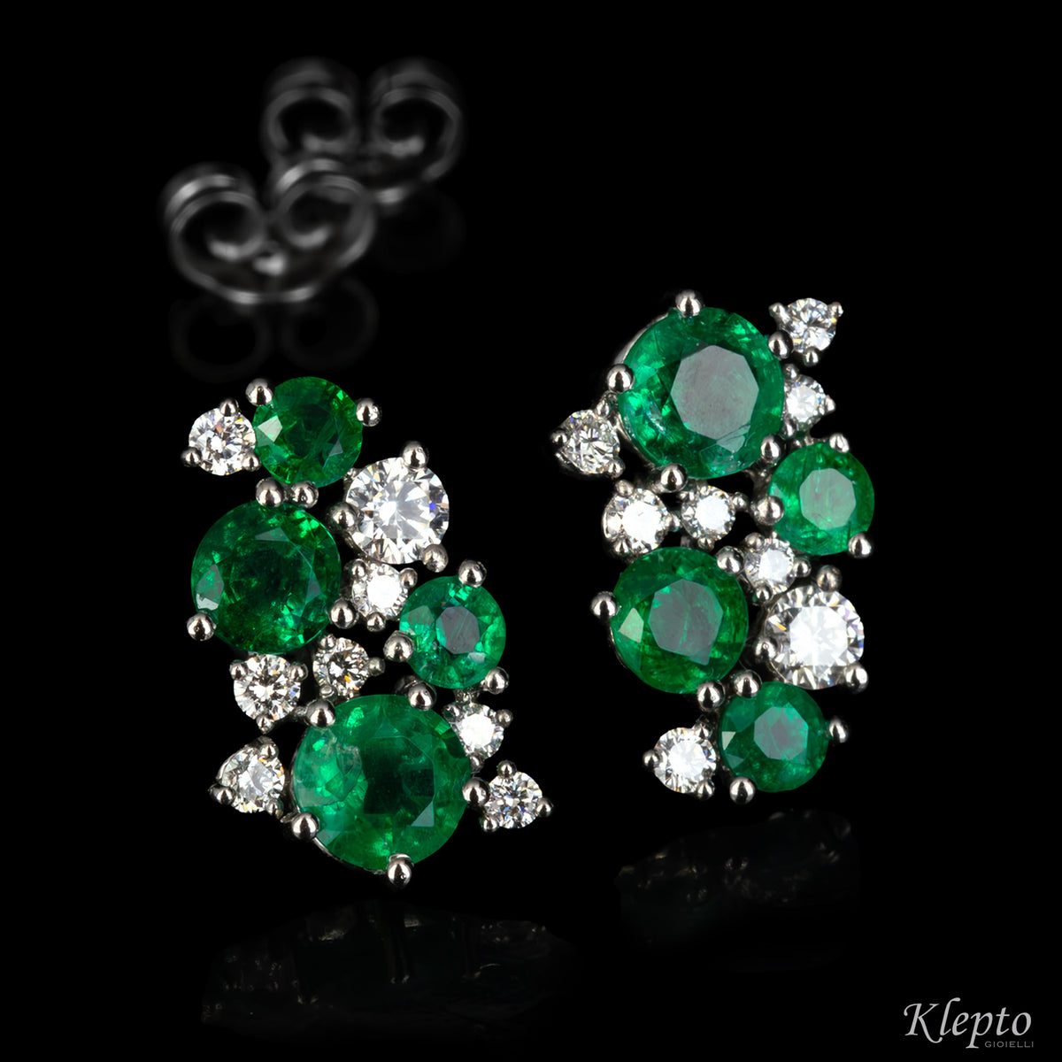 White gold earrings with emeralds and diamonds