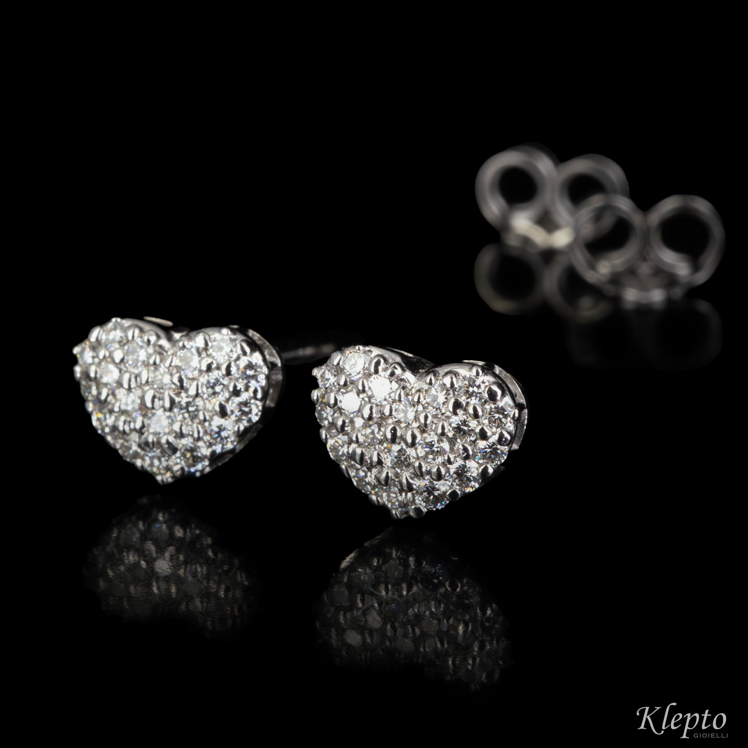 White gold heart earrings with diamonds