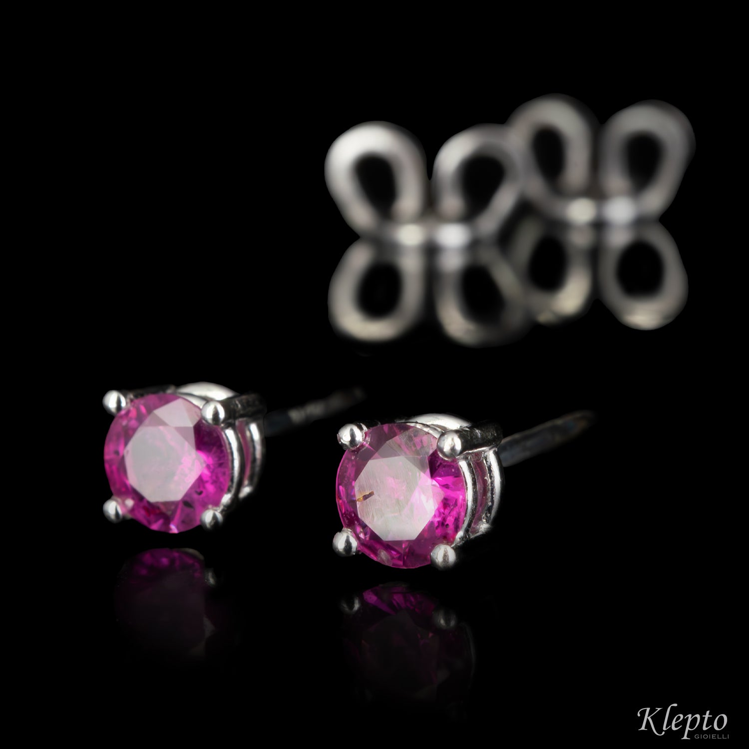 White gold earrings with rubies