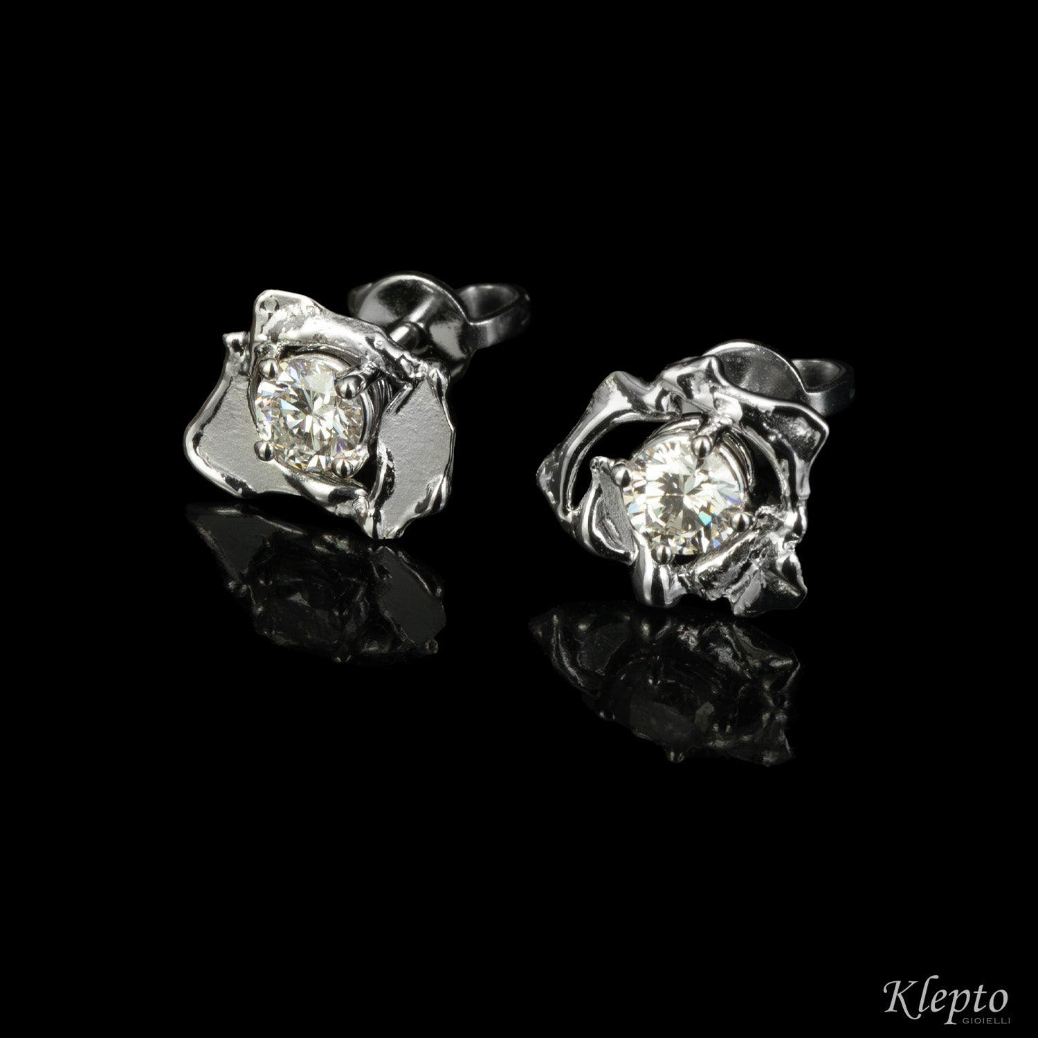 White gold earrings with "Pepita" diamonds