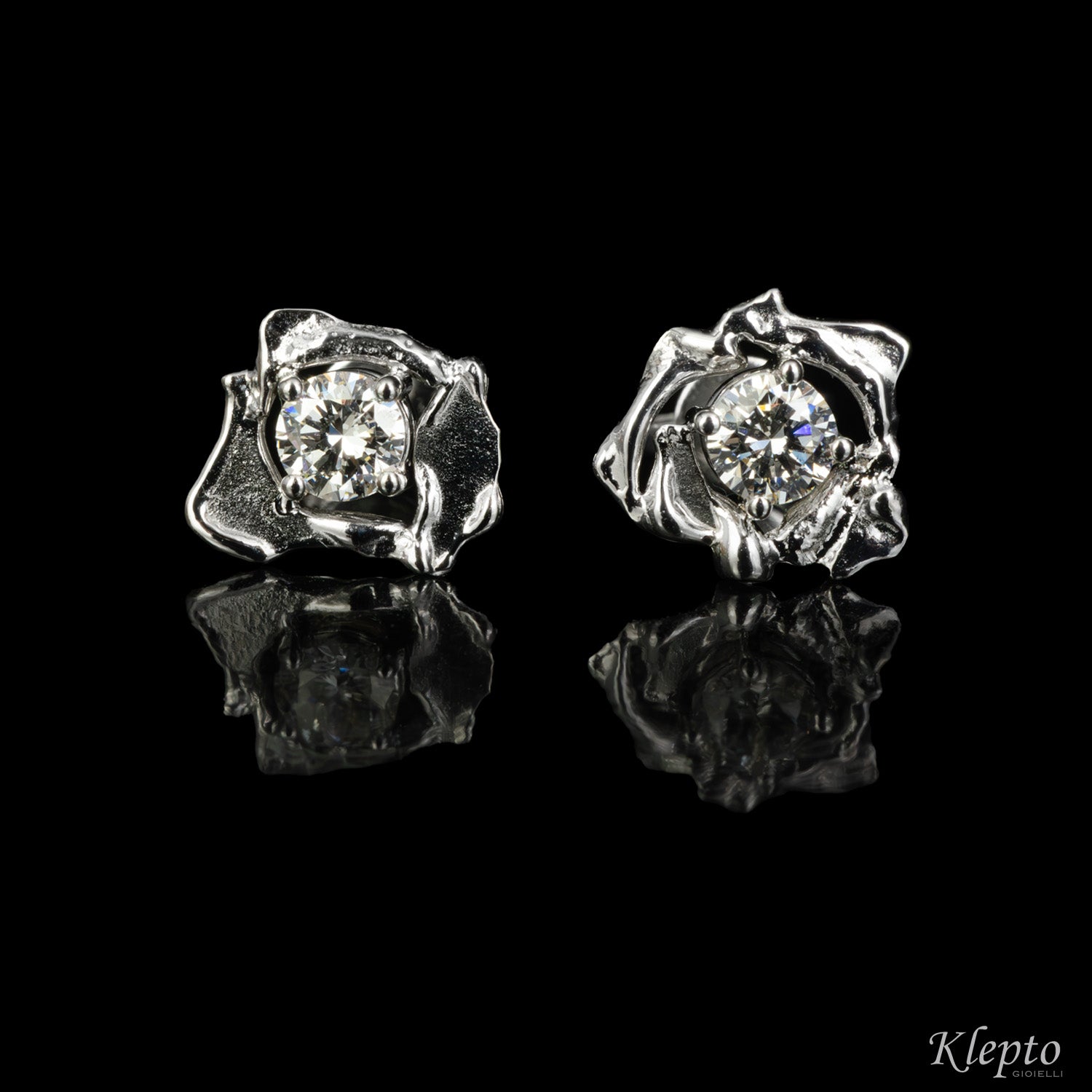 White gold earrings with "Pepita" diamonds