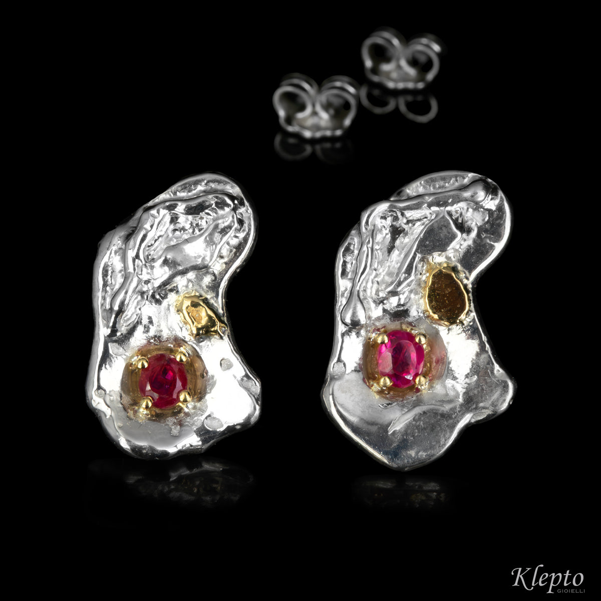 Silnova® silver earrings with rubies and yellow gold details