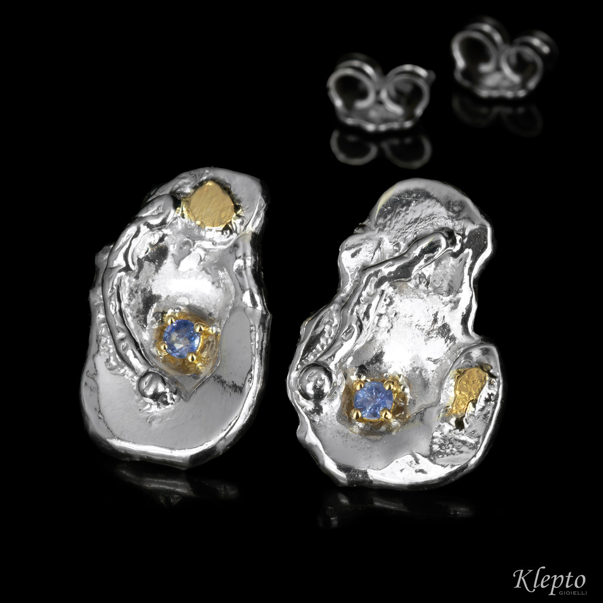 Silnova® silver earrings with blue sapphires and yellow gold details