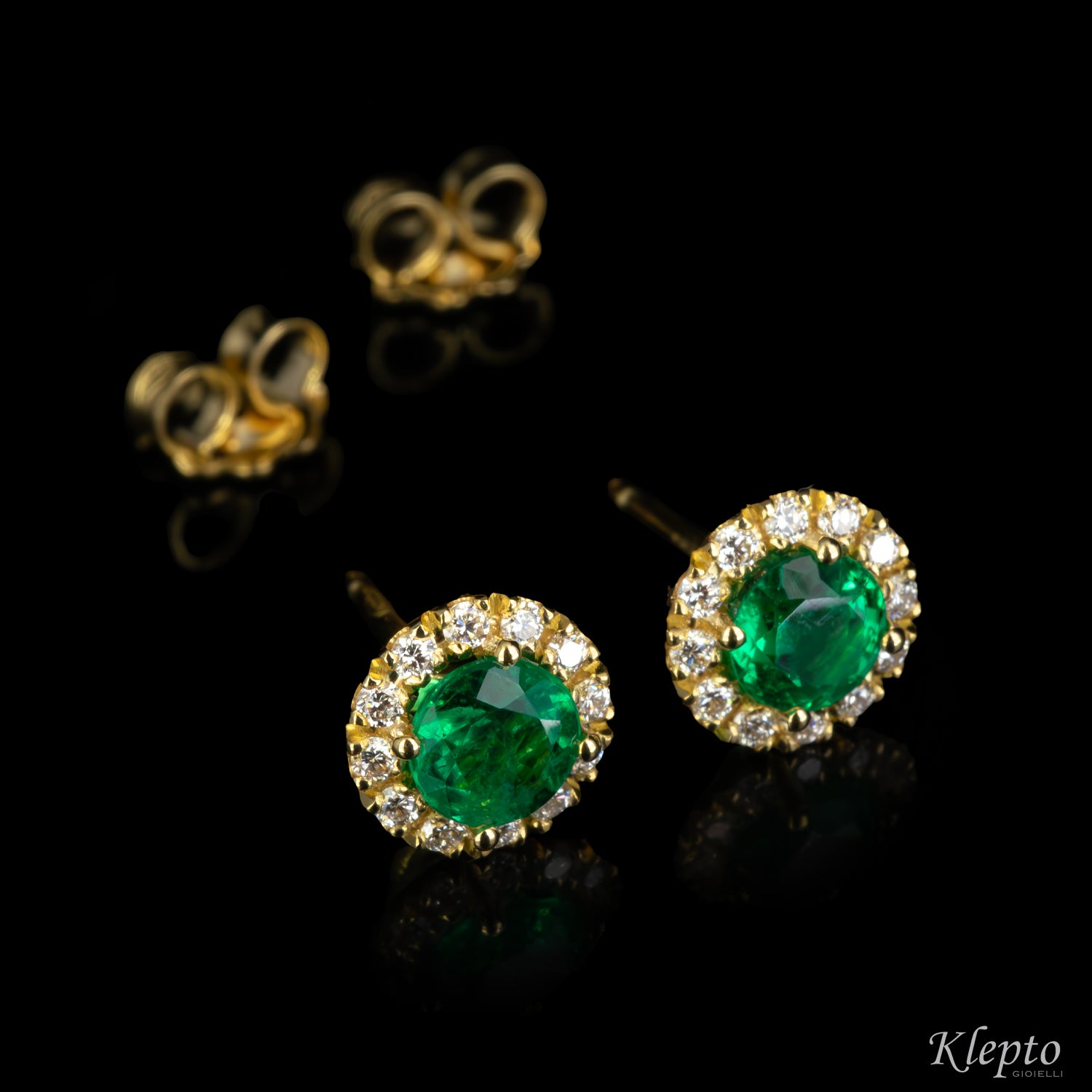 Yellow gold earrings with emeralds and diamonds