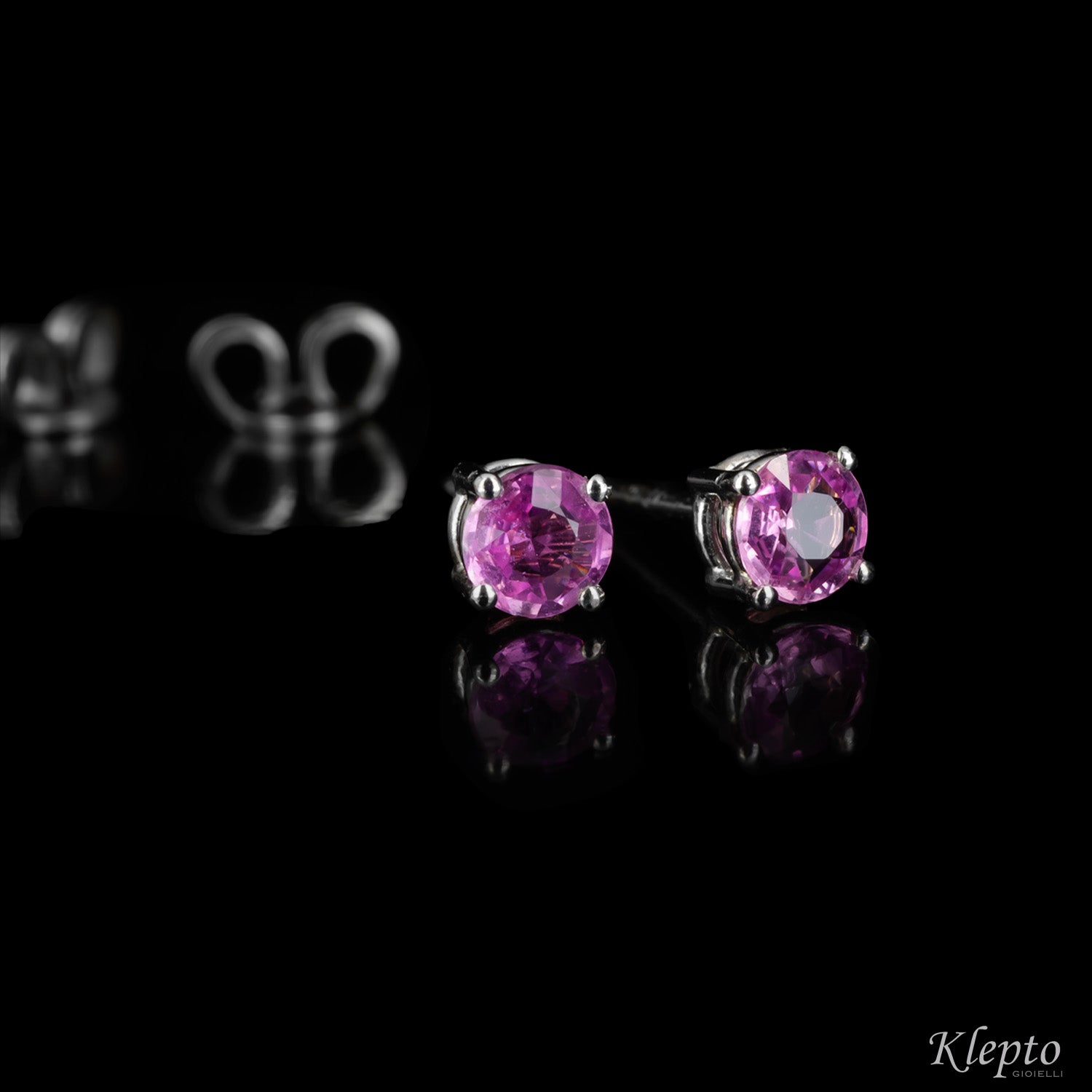 White gold earrings with pink sapphires