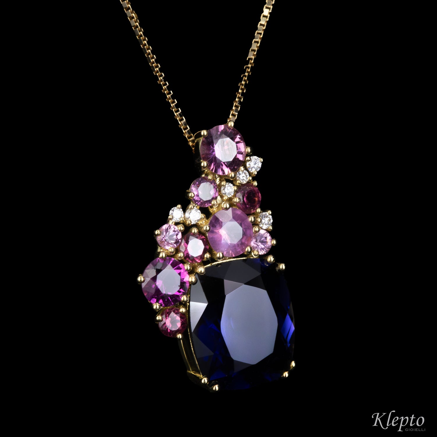 Yellow gold pendant with Iolite, Pink Sapphires, Rhodolites, and Diamonds