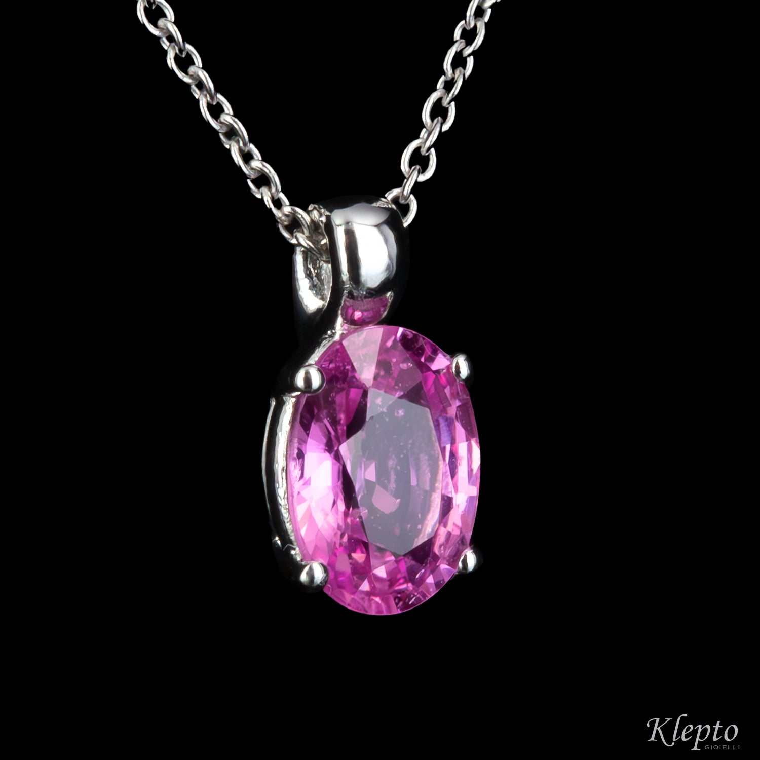 White gold pendant with pink sapphire