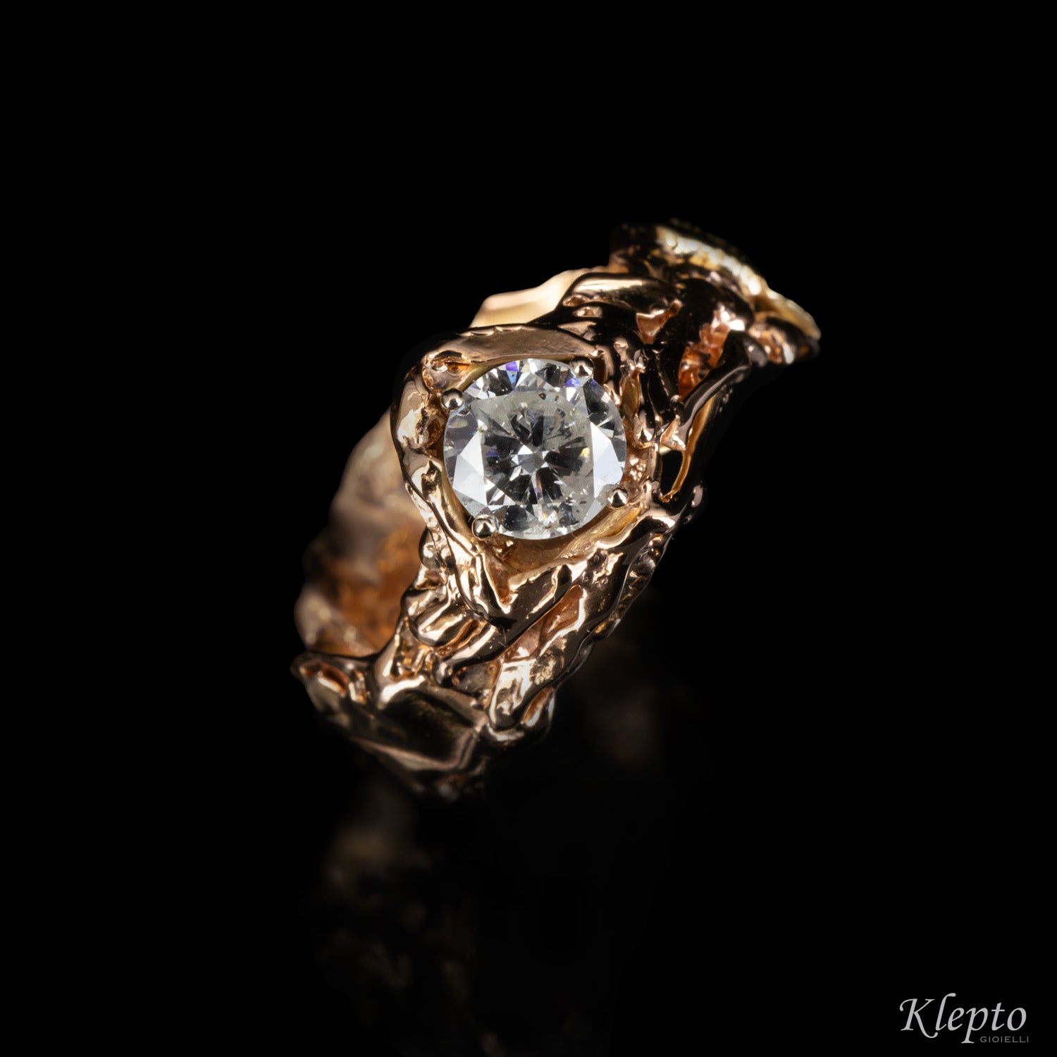 Solitaire in flame-fused rose gold with diamond
