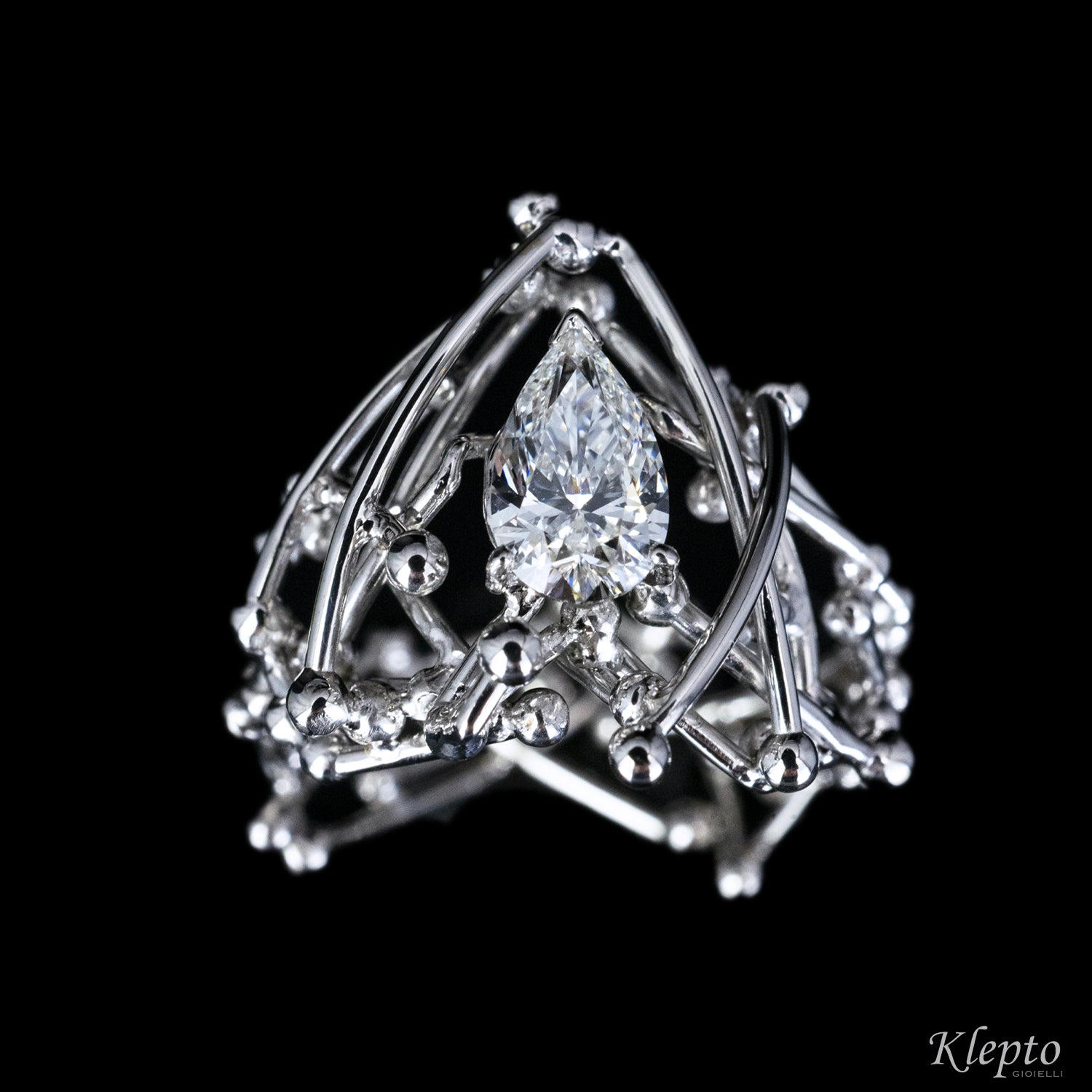 White gold solitaire with teardrop diamond