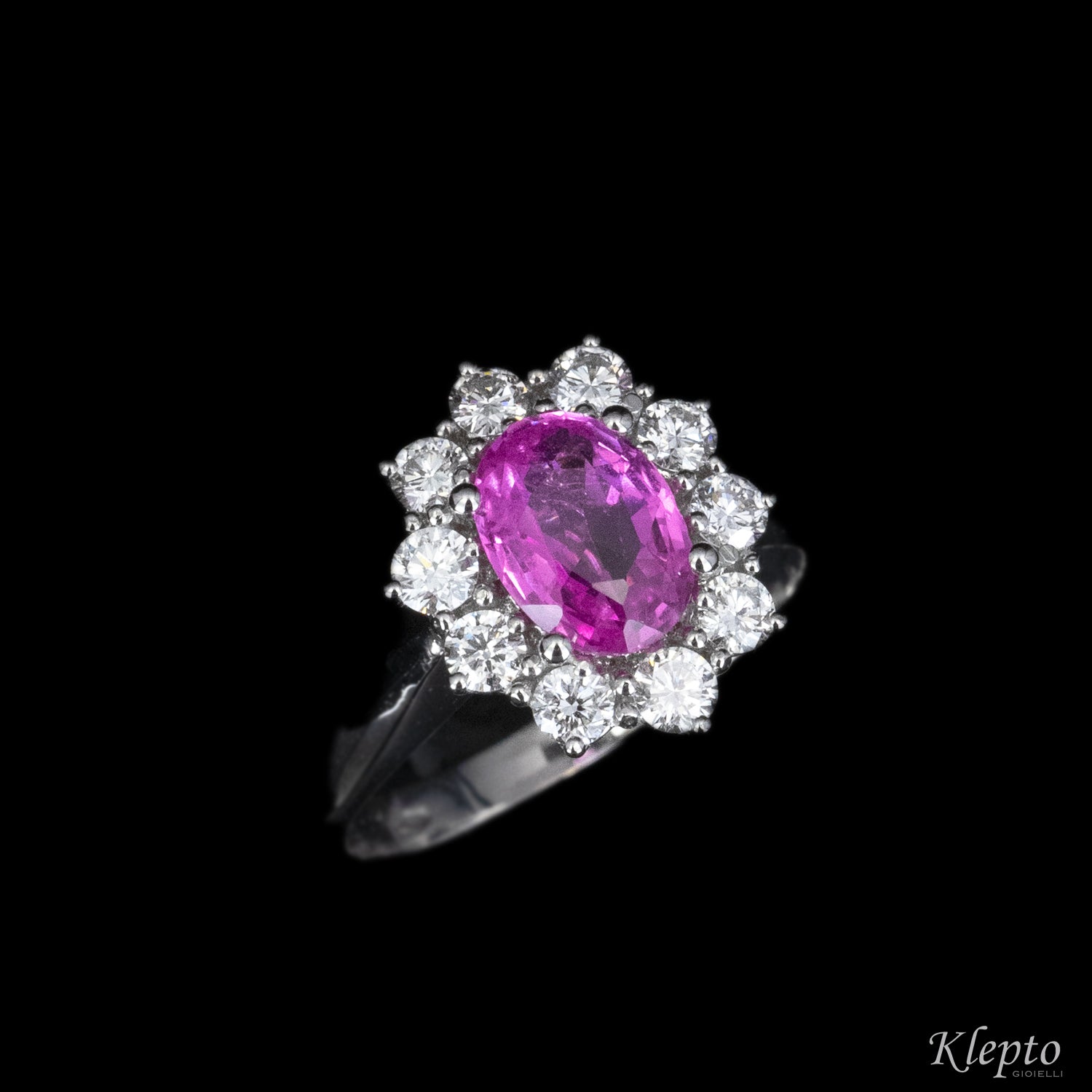 Classic ring in white gold with pink Sapphire and outline of Diamonds