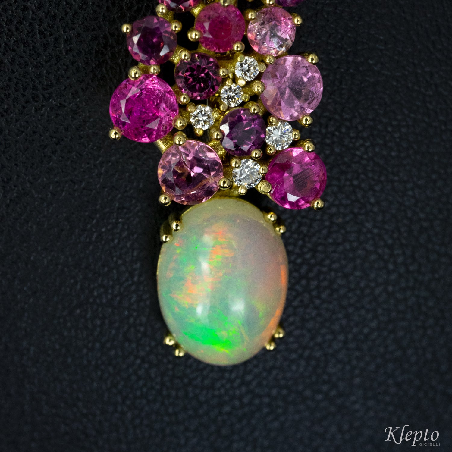 Yellow gold pendant with Tourmalines, Rhodolites, Opal and Diamonds.