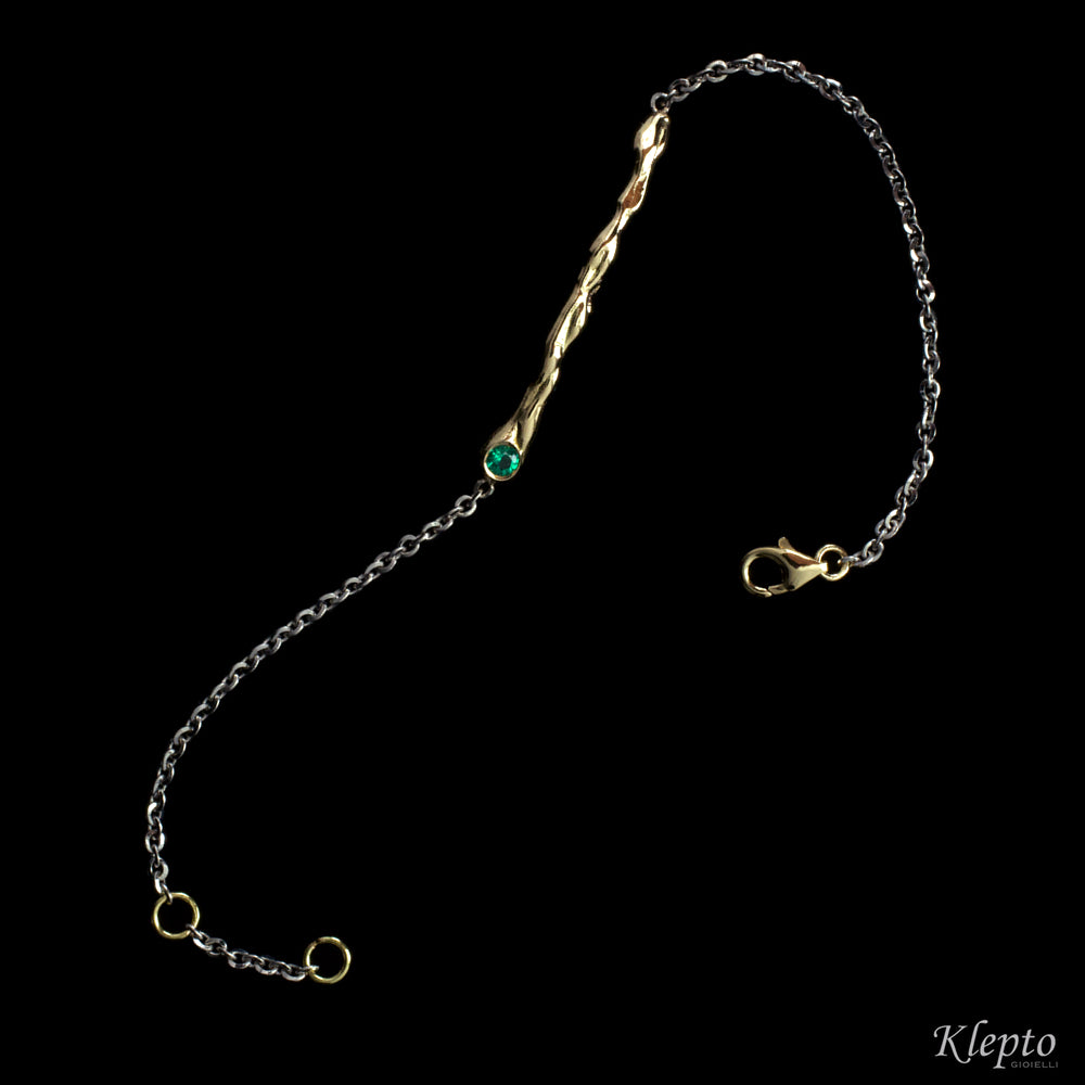 Bracelet in molten yellow gold and white chain with Emerald "bubbling waters"