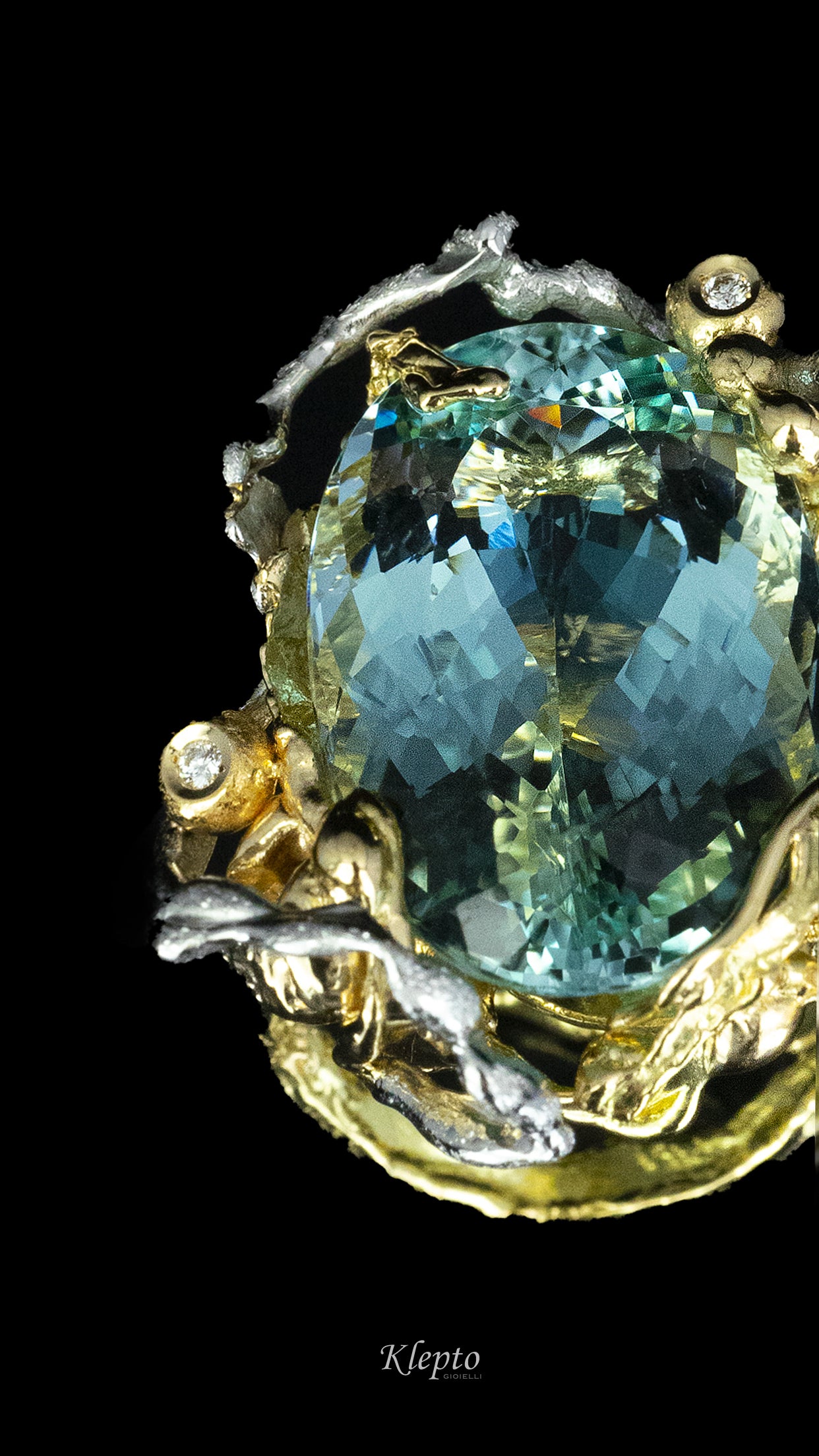 Ring in yellow gold and white gold with Aquamarine "Sette Mari"
