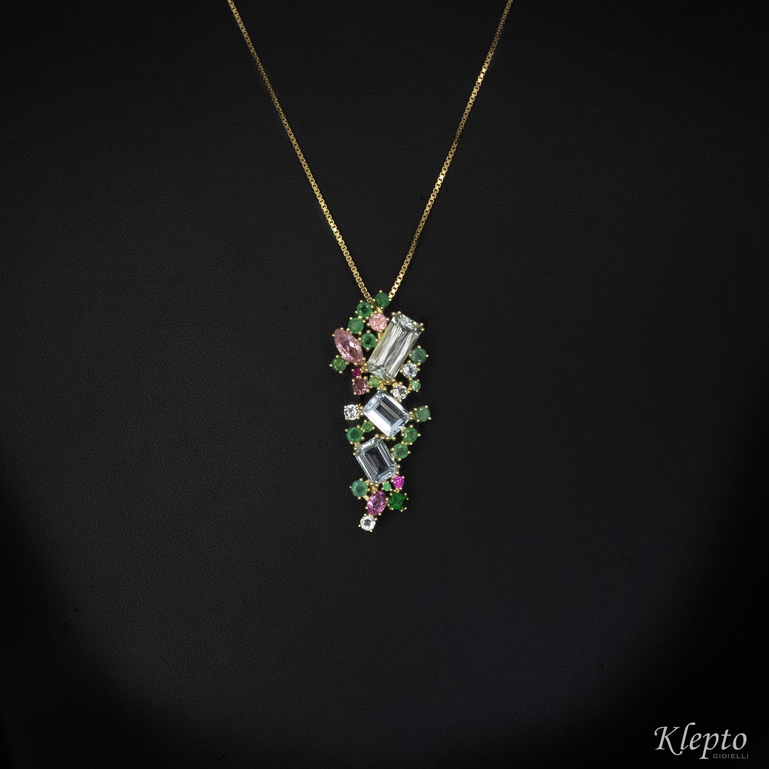 Yellow gold pendant with aquamarines, emeralds and pink tourmalines