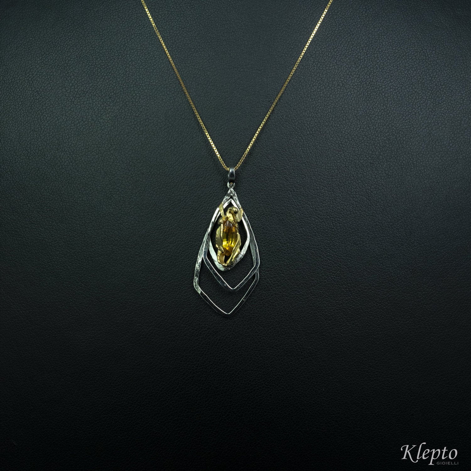 Pendant in white gold and yellow gold with natural Zircon
